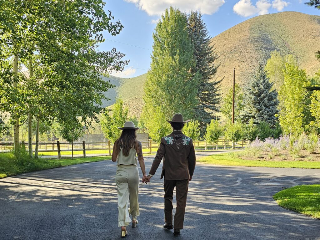 Bride and Groom walking to reception after ceremony in Sun Valley Idaho