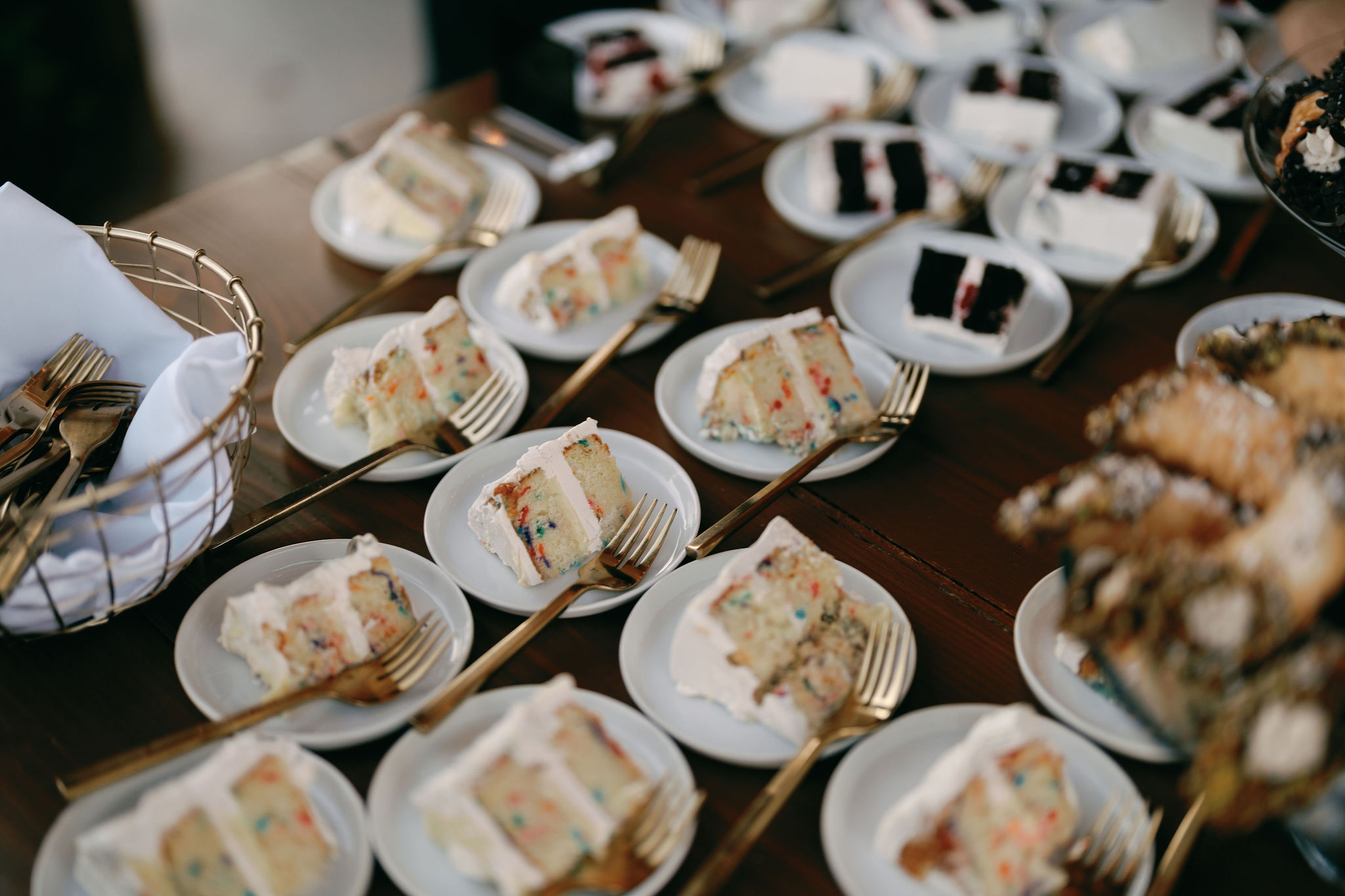 Wedding cake slices on plates